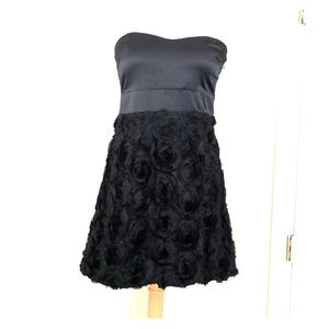 Women’s strapless black dress
